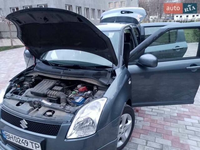 Серый Сузуки Свифт, объемом двигателя 1.49 л и пробегом 129 тыс. км за 6000 $, фото 23 на Automoto.ua
