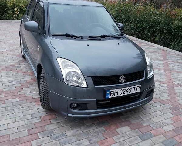 Серый Сузуки Свифт, объемом двигателя 1.49 л и пробегом 129 тыс. км за 6000 $, фото 1 на Automoto.ua