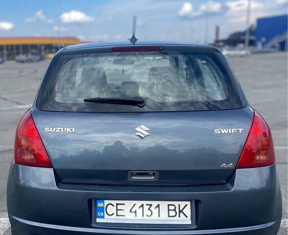 Серый Сузуки Свифт, объемом двигателя 1.3 л и пробегом 185 тыс. км за 4800 $, фото 1 на Automoto.ua