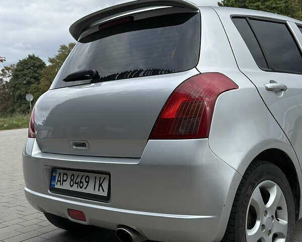 Сірий Сузукі Свифт, об'ємом двигуна 1.3 л та пробігом 214 тис. км за 3999 $, фото 20 на Automoto.ua