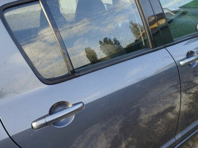 Серый Сузуки Свифт, объемом двигателя 1.5 л и пробегом 111 тыс. км за 5100 $, фото 2 на Automoto.ua