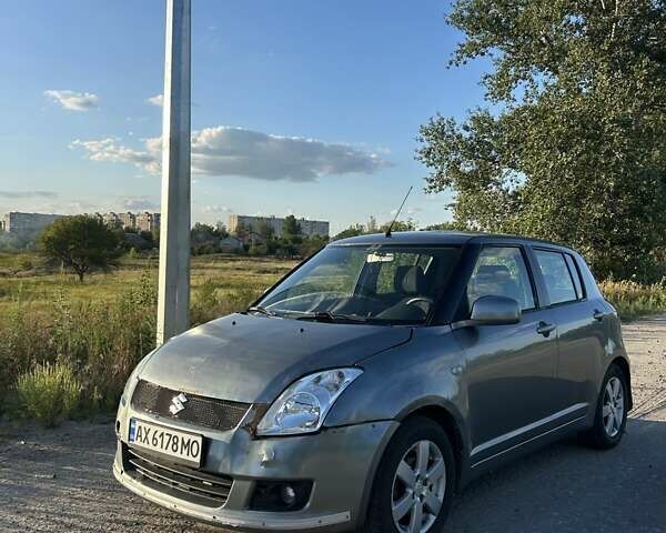 Серый Сузуки Свифт, объемом двигателя 1.33 л и пробегом 170 тыс. км за 3400 $, фото 1 на Automoto.ua