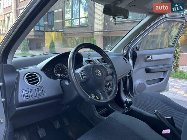 Сірий Сузукі Свифт, об'ємом двигуна 1.3 л та пробігом 189 тис. км за 4900 $, фото 22 на Automoto.ua