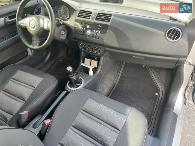 Сірий Сузукі Свифт, об'ємом двигуна 1.33 л та пробігом 260 тис. км за 3000 $, фото 10 на Automoto.ua