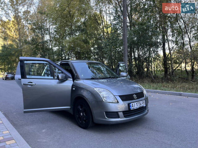 Серый Сузуки Свифт, объемом двигателя 1.3 л и пробегом 179 тыс. км за 5100 $, фото 17 на Automoto.ua