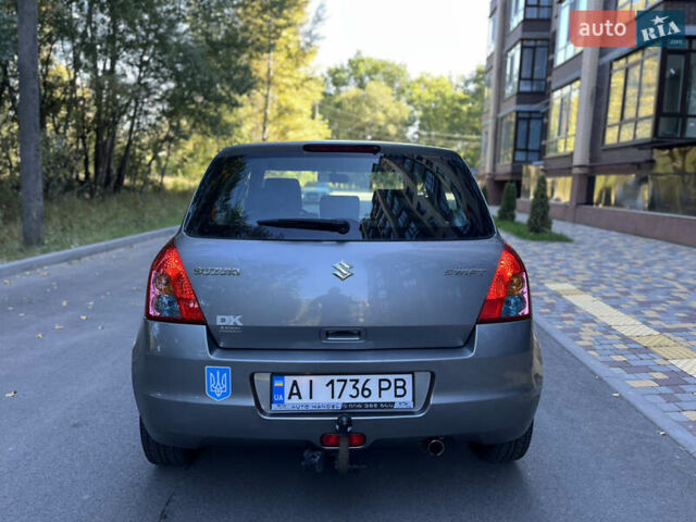Сірий Сузукі Свифт, об'ємом двигуна 1.3 л та пробігом 189 тис. км за 4900 $, фото 7 на Automoto.ua