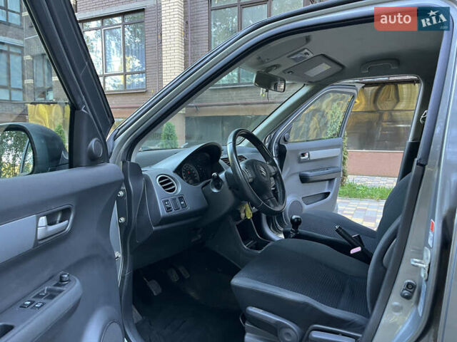Сірий Сузукі Свифт, об'ємом двигуна 1.3 л та пробігом 189 тис. км за 4900 $, фото 24 на Automoto.ua