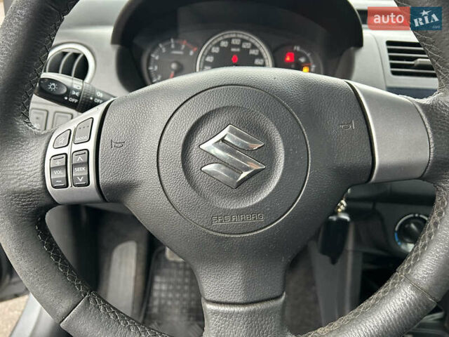 Сірий Сузукі Свифт, об'ємом двигуна 1.33 л та пробігом 243 тис. км за 4300 $, фото 8 на Automoto.ua