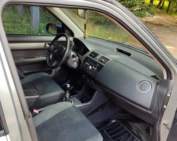 Сірий Сузукі Свифт, об'ємом двигуна 1.49 л та пробігом 199 тис. км за 5500 $, фото 5 на Automoto.ua