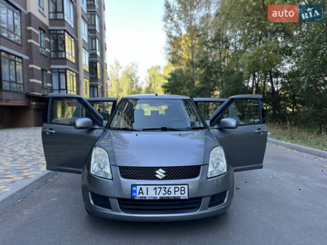Серый Сузуки Свифт, объемом двигателя 1.3 л и пробегом 179 тыс. км за 5100 $, фото 19 на Automoto.ua