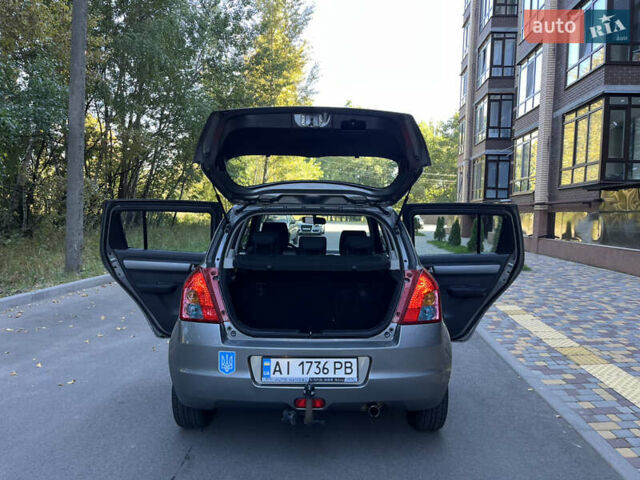 Сірий Сузукі Свифт, об'ємом двигуна 1.3 л та пробігом 189 тис. км за 4900 $, фото 14 на Automoto.ua
