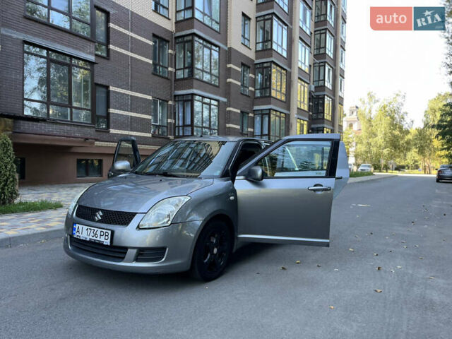 Сірий Сузукі Свифт, об'ємом двигуна 1.3 л та пробігом 189 тис. км за 5200 $, фото 25 на Automoto.ua