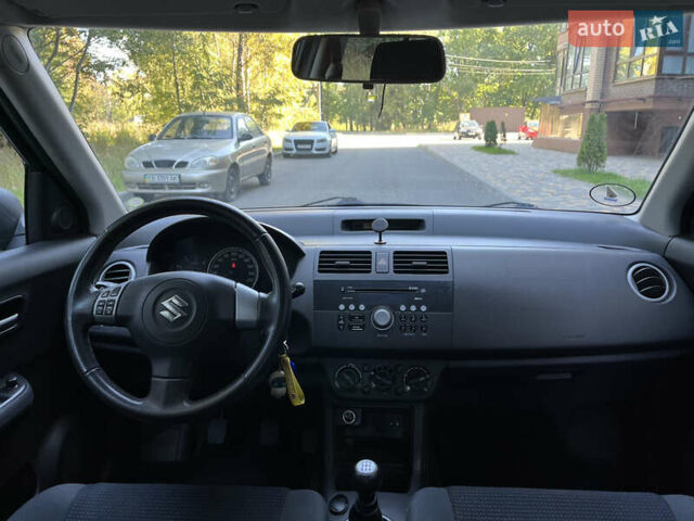 Сірий Сузукі Свифт, об'ємом двигуна 1.3 л та пробігом 189 тис. км за 5200 $, фото 35 на Automoto.ua