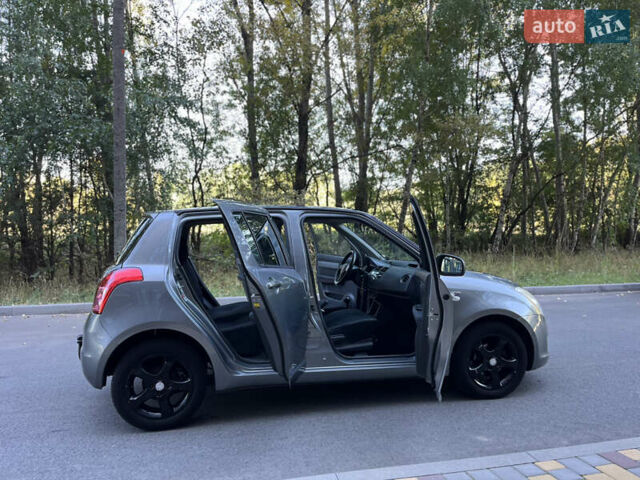 Сірий Сузукі Свифт, об'ємом двигуна 1.3 л та пробігом 189 тис. км за 4900 $, фото 20 на Automoto.ua