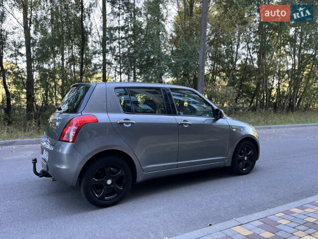 Сірий Сузукі Свифт, об'ємом двигуна 1.3 л та пробігом 189 тис. км за 4900 $, фото 3 на Automoto.ua