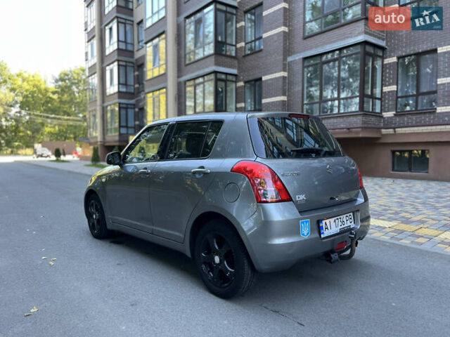 Сірий Сузукі Свифт, об'ємом двигуна 1.3 л та пробігом 189 тис. км за 4900 $, фото 8 на Automoto.ua