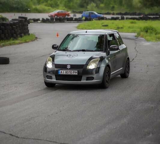 Сірий Сузукі Свифт, об'ємом двигуна 1.49 л та пробігом 185 тис. км за 4500 $, фото 13 на Automoto.ua