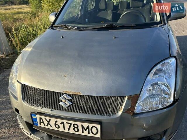 Серый Сузуки Свифт, объемом двигателя 1.33 л и пробегом 170 тыс. км за 3400 $, фото 5 на Automoto.ua