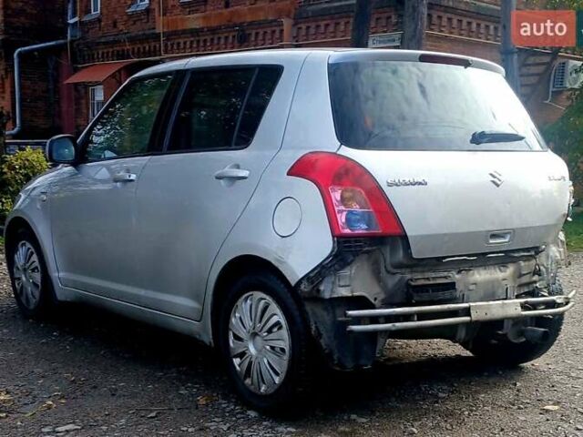 Сірий Сузукі Свифт, об'ємом двигуна 1.25 л та пробігом 150 тис. км за 3800 $, фото 1 на Automoto.ua