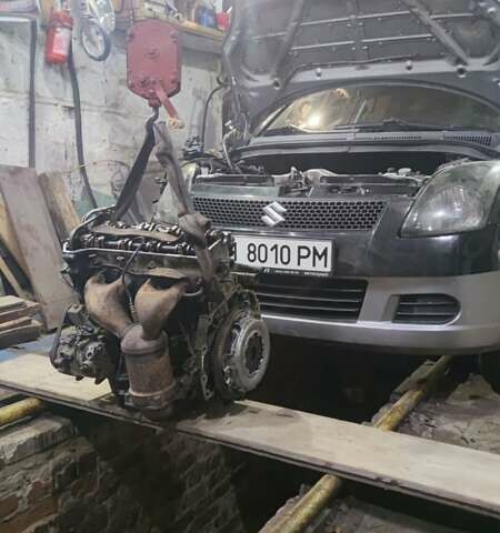 Сірий Сузукі Свифт, об'ємом двигуна 1.49 л та пробігом 185 тис. км за 4500 $, фото 8 на Automoto.ua