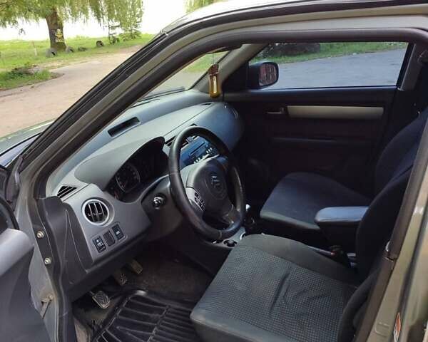 Сірий Сузукі Свифт, об'ємом двигуна 1.49 л та пробігом 199 тис. км за 5500 $, фото 9 на Automoto.ua