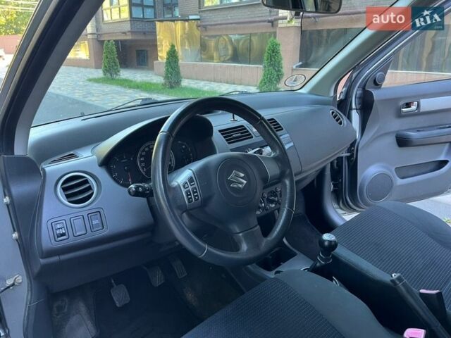Серый Сузуки Свифт, объемом двигателя 1.3 л и пробегом 189 тыс. км за 4900 $, фото 28 на Automoto.ua