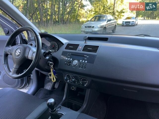 Серый Сузуки Свифт, объемом двигателя 1.3 л и пробегом 189 тыс. км за 4900 $, фото 31 на Automoto.ua