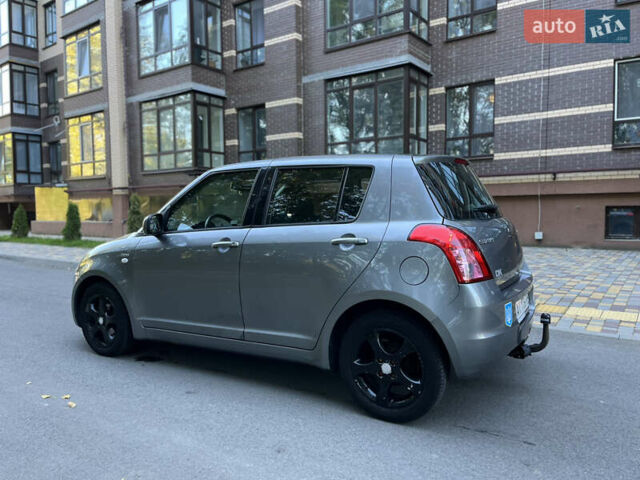 Сірий Сузукі Свифт, об'ємом двигуна 1.3 л та пробігом 189 тис. км за 4900 $, фото 13 на Automoto.ua