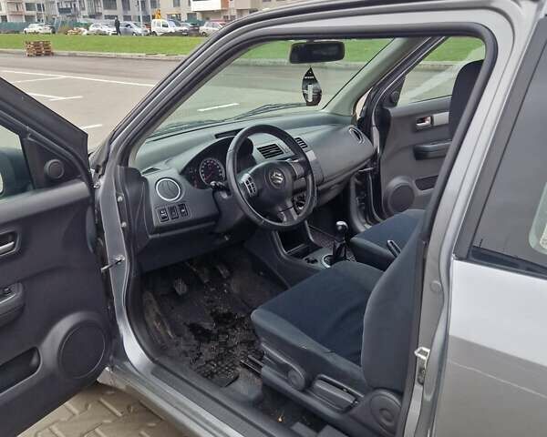 Серый Сузуки Свифт, объемом двигателя 1.33 л и пробегом 190 тыс. км за 4200 $, фото 9 на Automoto.ua
