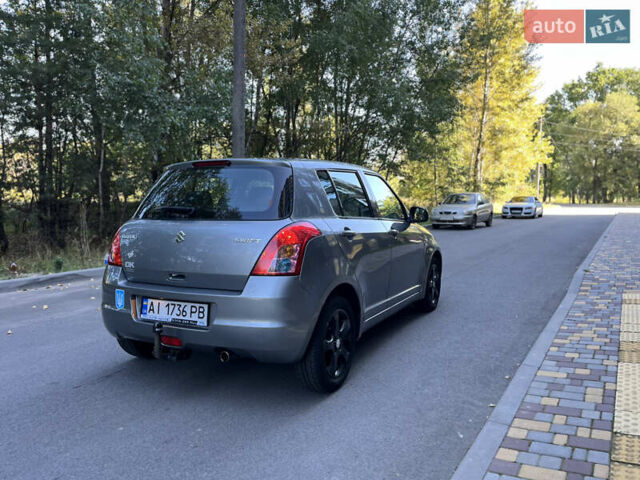Сірий Сузукі Свифт, об'ємом двигуна 1.3 л та пробігом 189 тис. км за 4900 $, фото 9 на Automoto.ua