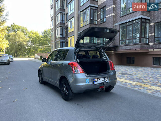 Сірий Сузукі Свифт, об'ємом двигуна 1.3 л та пробігом 189 тис. км за 4900 $, фото 16 на Automoto.ua