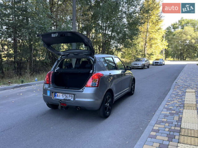 Сірий Сузукі Свифт, об'ємом двигуна 1.3 л та пробігом 189 тис. км за 4900 $, фото 15 на Automoto.ua