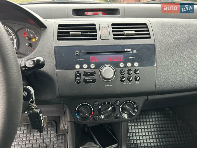 Сірий Сузукі Свифт, об'ємом двигуна 1.33 л та пробігом 243 тис. км за 4300 $, фото 11 на Automoto.ua