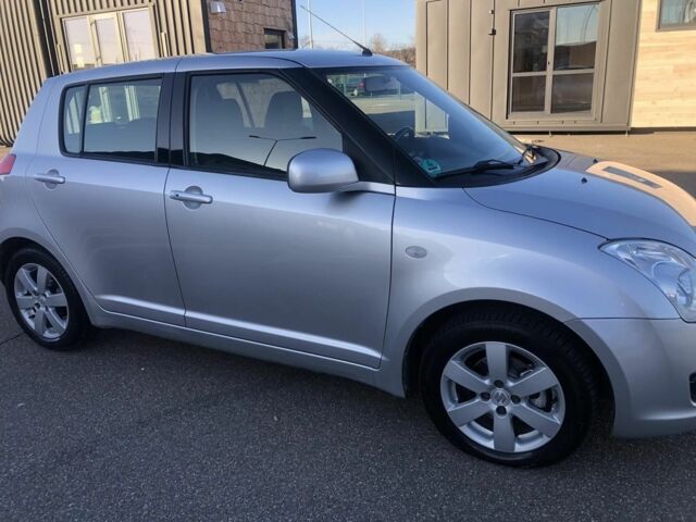 Сірий Сузукі Свифт, об'ємом двигуна 1.5 л та пробігом 195 тис. км за 7450 $, фото 1 на Automoto.ua