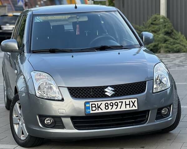 Сірий Сузукі Свифт, об'ємом двигуна 1.49 л та пробігом 143 тис. км за 8031 $, фото 6 на Automoto.ua