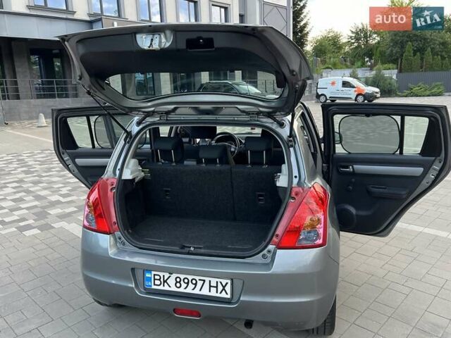 Сірий Сузукі Свифт, об'ємом двигуна 1.49 л та пробігом 143 тис. км за 8031 $, фото 22 на Automoto.ua