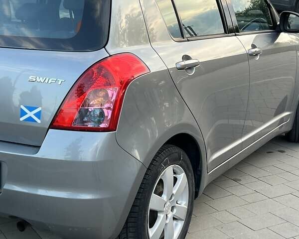 Сірий Сузукі Свифт, об'ємом двигуна 1.49 л та пробігом 143 тис. км за 8031 $, фото 2 на Automoto.ua