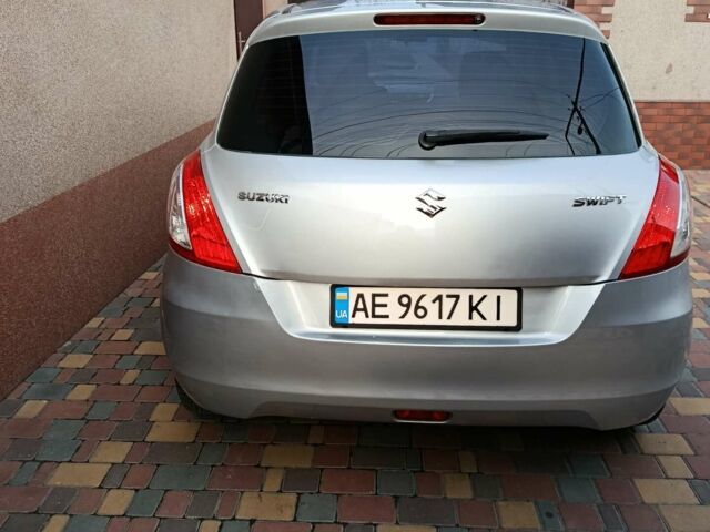 Серый Сузуки Свифт, объемом двигателя 1.24 л и пробегом 158 тыс. км за 5500 $, фото 2 на Automoto.ua