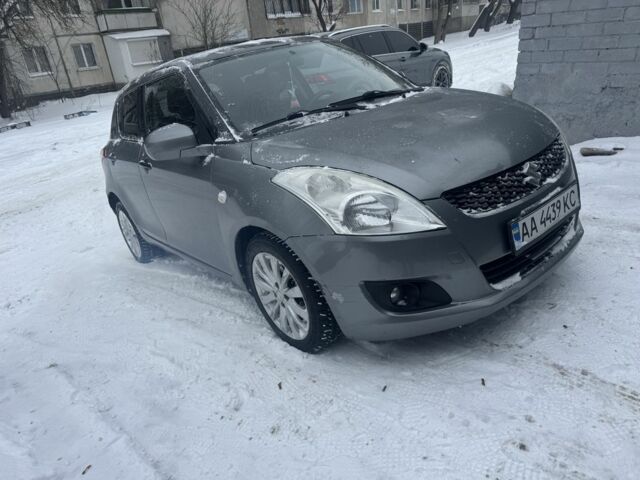 Сірий Сузукі Свифт, об'ємом двигуна 1.2 л та пробігом 180 тис. км за 4699 $, фото 4 на Automoto.ua