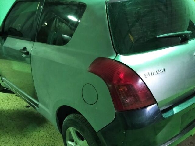 Сірий Сузукі Свифт, об'ємом двигуна 1.3 л та пробігом 167 тис. км за 1900 $, фото 3 на Automoto.ua