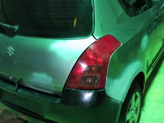 Сірий Сузукі Свифт, об'ємом двигуна 1.3 л та пробігом 167 тис. км за 1900 $, фото 4 на Automoto.ua