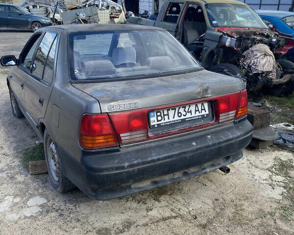 Сузукі Свифт 1994 у Вознесенске на Automoto.ua Сірий Сузукі Свифт, об'ємом двигуна 1.6 л та пробігом 253 тис. км за 500 $, фото 2 на Automoto.ua