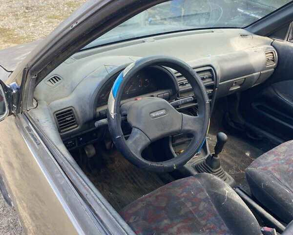 Сузукі Свифт 1994 у Вознесенске на Automoto.ua Сірий Сузукі Свифт, об'ємом двигуна 1.6 л та пробігом 253 тис. км за 500 $, фото 6 на Automoto.ua