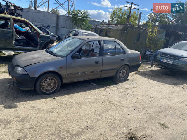 Сузукі Свифт 1994 у Вознесенске на Automoto.ua Сірий Сузукі Свифт, об'ємом двигуна 1.6 л та пробігом 253 тис. км за 500 $, фото 3 на Automoto.ua