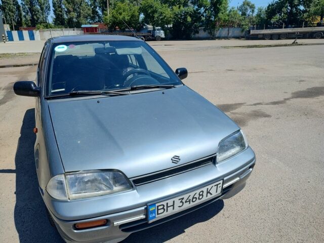 Сірий Сузукі Свифт, об'ємом двигуна 1.3 л та пробігом 350 тис. км за 1800 $, фото 1 на Automoto.ua