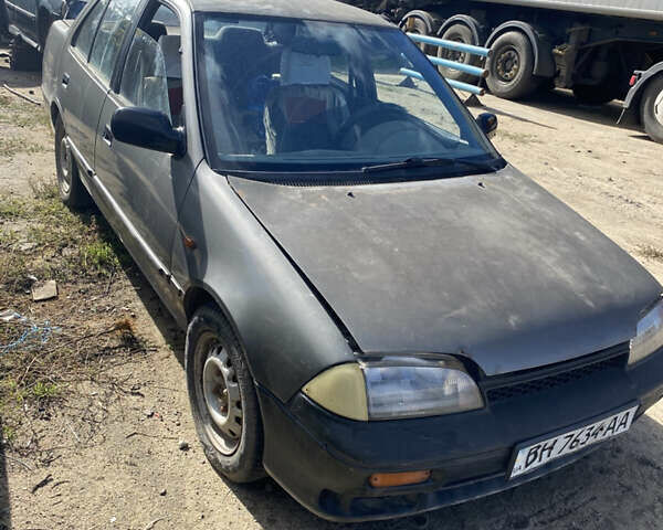 Сузукі Свифт 1994 у Вознесенске на Automoto.ua Сірий Сузукі Свифт, об'ємом двигуна 1.6 л та пробігом 253 тис. км за 500 $, фото 4 на Automoto.ua