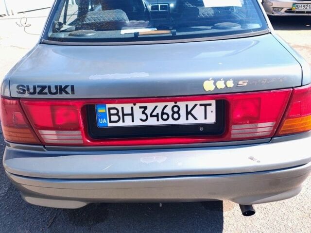 Серый Сузуки Свифт, объемом двигателя 1.3 л и пробегом 250 тыс. км за 1800 $, фото 1 на Automoto.ua