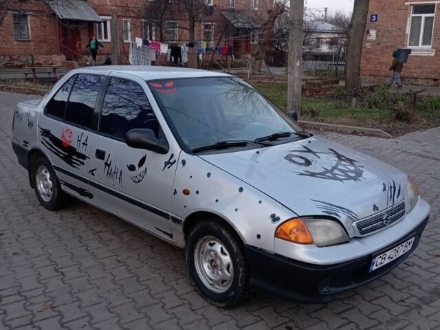 Серый Сузуки Свифт, объемом двигателя 1.3 л и пробегом 111 тыс. км за 1300 $, фото 1 на Automoto.ua