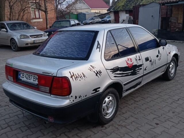 Серый Сузуки Свифт, объемом двигателя 1.3 л и пробегом 111 тыс. км за 1300 $, фото 2 на Automoto.ua