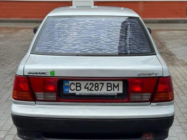 Серый Сузуки Свифт, объемом двигателя 1.3 л и пробегом 200 тыс. км за 1350 $, фото 7 на Automoto.ua